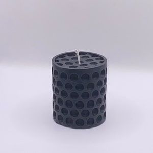 Black cylinder pillar candle